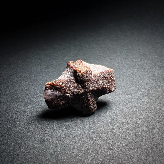 Staurolite stone with cross shape