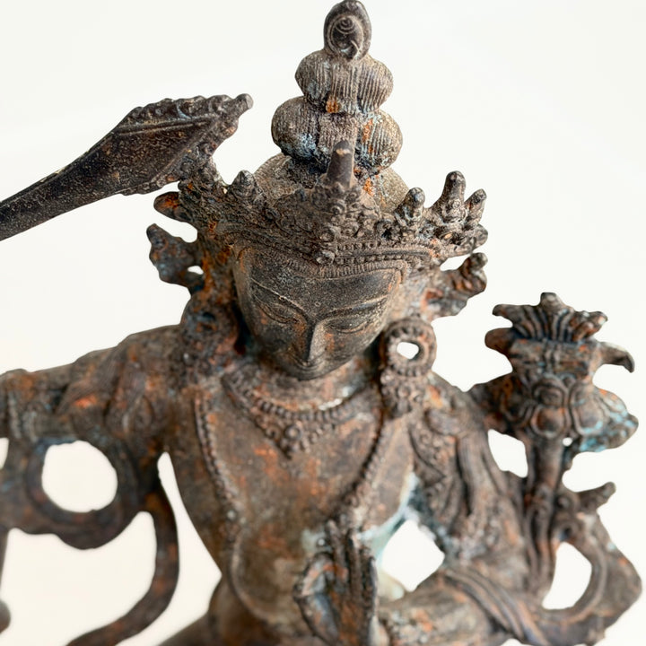 Head detail with crown and facial expression