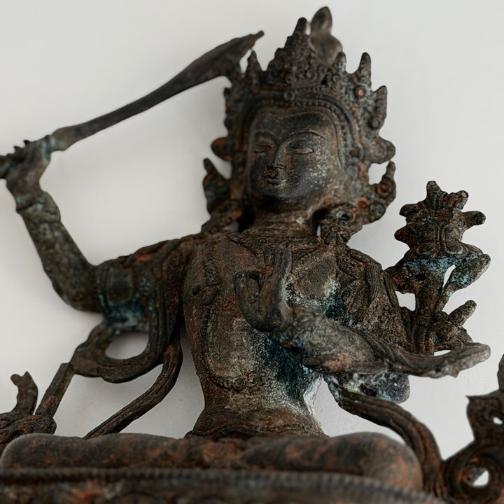 Head detail with crown and facial expression