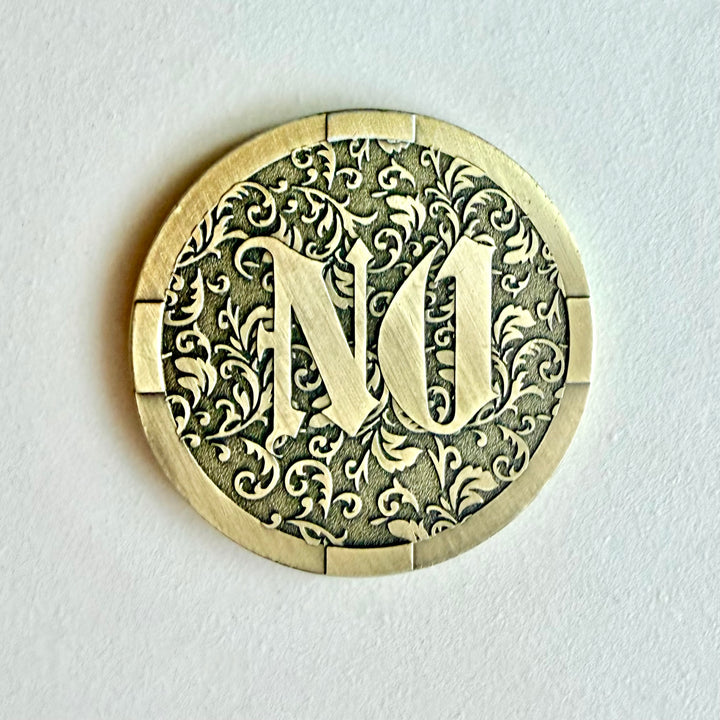 YES / NO -päätöskolikko