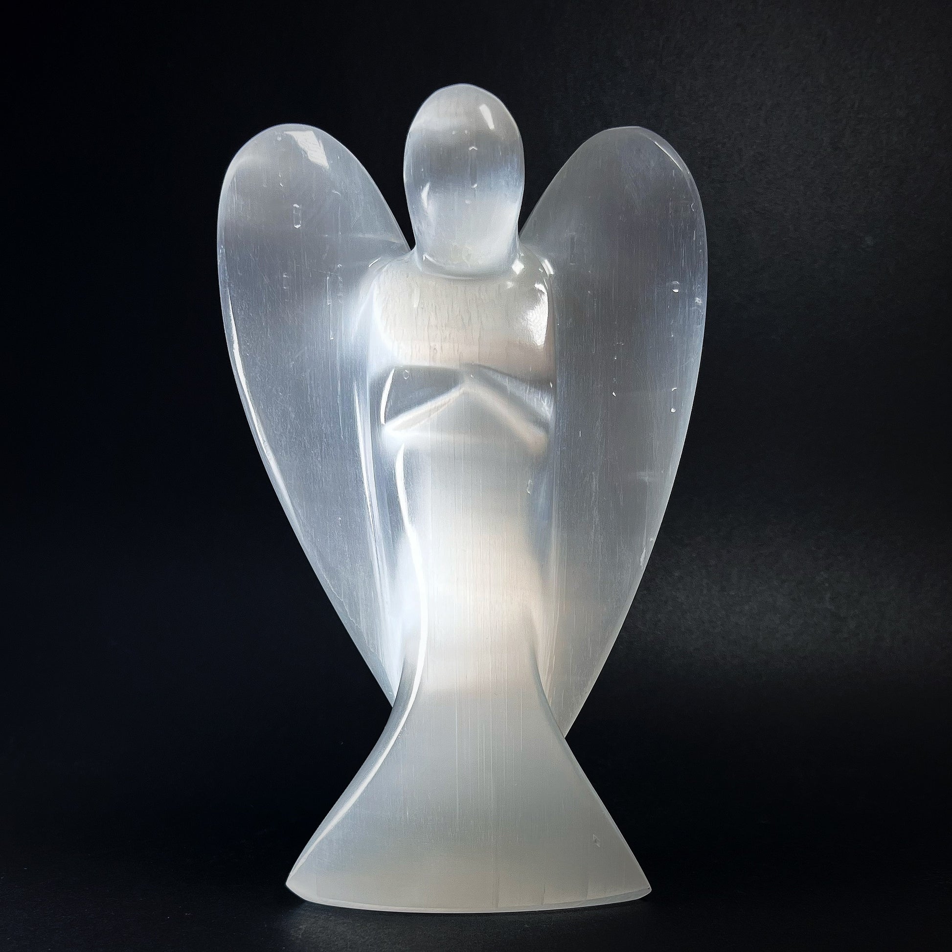 Angel figure carved out of selenite.