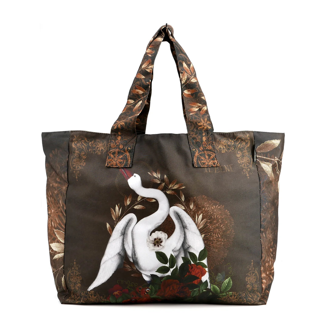 Voglio Bene -tote bag, etupuoli, kuvassa valkea joutsen, symboloi puhtautta ja hengellistä kirkautta. - Voglio Bene tote bag, front view, featuring a white swan, symbolising purity and spiritual clarity.