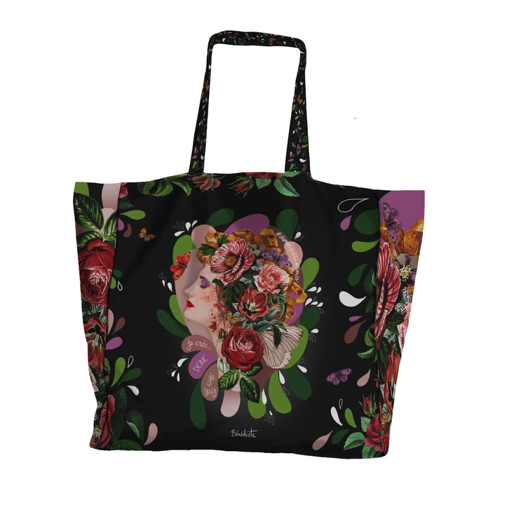 Voglio Bene “I Think” -tote bag etunäkymä, jossa sama naisen sivuprofiilikuva toistuu pussukan toisella puolella.
Front view of a Voglio Bene “I Think” tote bag, featuring the same decorated female side profile artwork repeated on the reverse side.