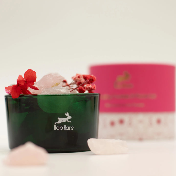 Hop Hare The Lovers crystal diffuser with rose quartz and its pink packaging in the background.