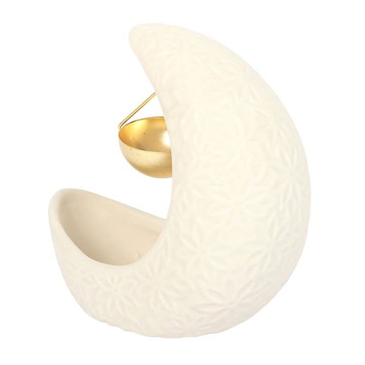 Embossed leaf pattern on the Crescent Moon oil burner, viewed from the rear at an angle.
