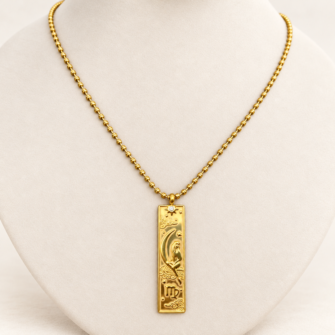 18K gold-plated Zodiac necklace, Virgo, on a light-coloured jewellery bust.